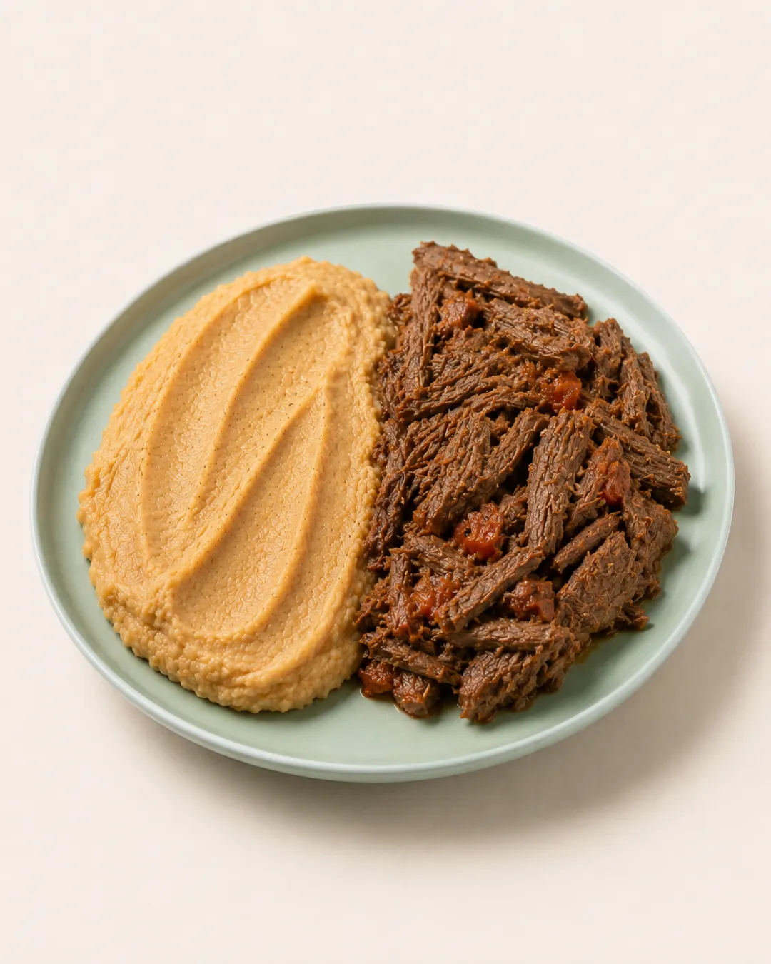 Bondiola braseada con puré de batata — vianda saludable congelada de Hakora Cocina